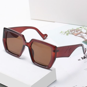 Fashionable oversized square sunglasses with burgundy frames and unique wavy temple design