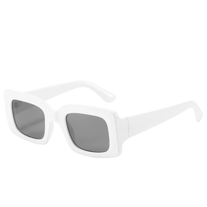 Fashionable white rectangular frame sunglasses with dark lenses from a 45-degree angle