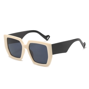 Classic large square sunglasses with cream frames and black temples for a modern look
