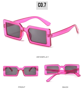 Detailed views of bright pink transparent rectangular sunglasses with dark grey lenses