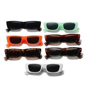 Set of 7 vintage rectangular cat-eye sunglasses in multiple colors on a white background