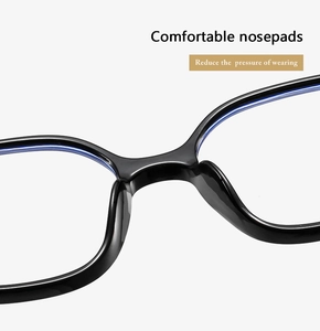 Macro detail of comfortable integrated nose pads on black blue light blocking glasses
