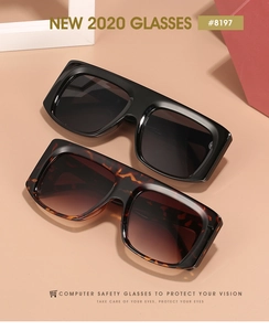 Flat lay of oversized rectangle sunglasses in black and tortoiseshell with UV400 lenses