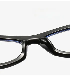 Macro detail of the integrated ergonomic nose pads on vintage black eyeglass frames