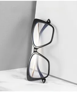 Detailed view of black thick-frame blue light blocking glasses with anti-reflective lenses