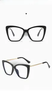 Front and side view of black cat-eye glasses frames with golden metal temples