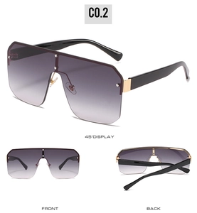 Three-view display of oversized gradient sunglasses with silver rivets and gold accents