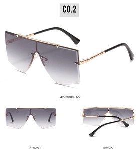 Détails de lunettes de soleil carrées sans monture avec barre dorée et verres dégradés