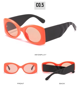 Three perspectives of trendy oval sunglasses with thick orange frames and wide wave temples
