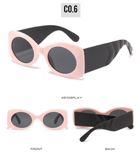 Front and side view of oval pink sunglasses with thick black arms and retro design