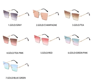 Grille de lunettes de soleil œil de chat sans monture avec verres dégradés et branches or