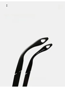 Detail of curved black sunglasses legs with arc design for comfortable outdoor wear