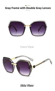 Detail view of square oversized sunglasses with grey frames and purple gradient lenses