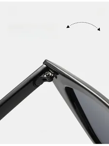 Macro shot of durable metal hinge on black cat eye sunglasses for smooth folding