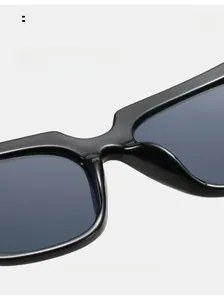 Detail of integrated nose pads on black cat-eye sunglasses for mark-free comfort