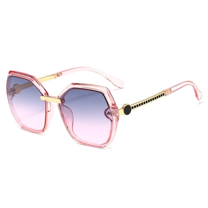 Fashionable square sunglasses with pink gradient lenses and transparent pink frames