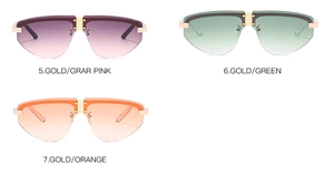 Detail of rimless gradient sunglasses featuring gold metal bridge and rivet accents