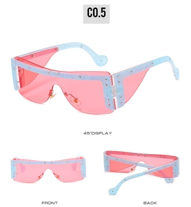 Three views of pink shield sunglasses with blue denim pattern frame and silver rivet details
