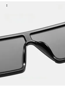 Detailed view of comfortable integrated nose pads on classic black oversized sunglasses