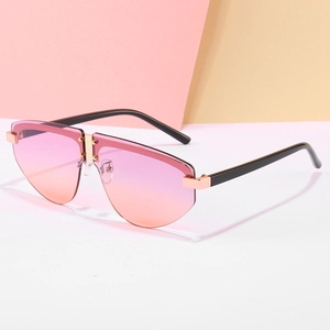 Frameless oversized aviator sunglasses with pink to orange gradient jelly lenses