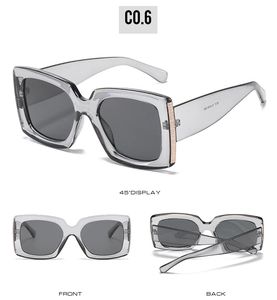 Three views of grey square sunglasses with smoke lenses and gold metal hinge accents