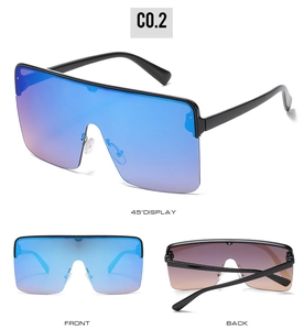 Three angles of oversized shield sunglasses with blue-purple gradient lenses and black frames