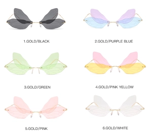 Flat lay of dragonfly wing sunglasses in six gradient colors with gold frameless design