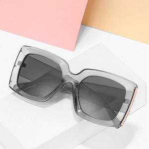 Fashionable square frame sunglasses in smoke gray with rose gold metal accents