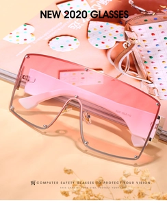 Close-up of pink gradient oversized rimless sunglasses with silver metal hinge details