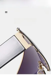 Macro view of purple gradient lens with golden rivets and flexible metal hinge