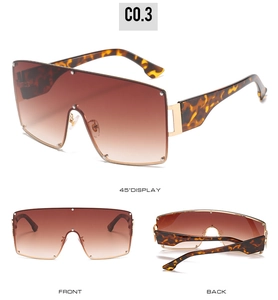 Three-angle view of oversized rimless sunglasses with gradient lenses and studded details