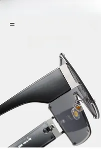 Detail showing high-quality black temple with silver metal hinge on oversized sunglasses