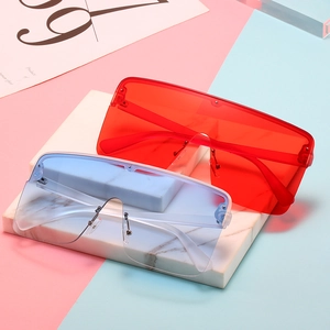 Oversized one-piece wrap sunglasses in red and blue gradient for a trendy fashion look