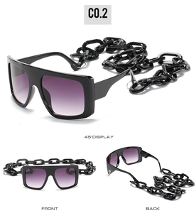 Detailed views of oversized hip hop sunglasses with thick black chains and purple lenses