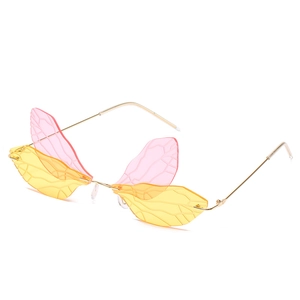 Retro steampunk dragonfly wing sunglasses with pink yellow gradient lenses and gold frame
