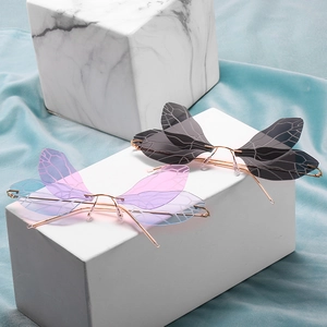 Frameless dragonfly wing steampunk sunglasses with gradient lenses and gold metal temples