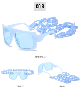 Three perspectives of light blue oversized square sunglasses with thick plastic chain link