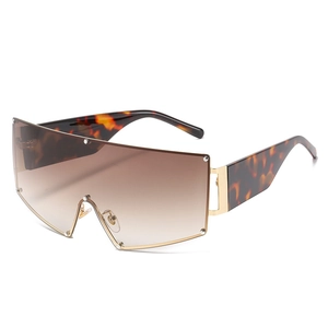 Oversized wrap sunglasses with gradient brown lenses and tortoise shell temples