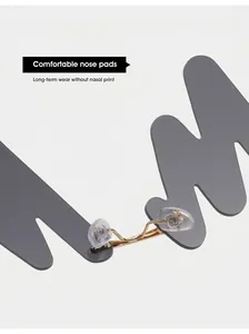 Detailed macro of comfortable silicone nose pads and gold bridge on wave sunglasses