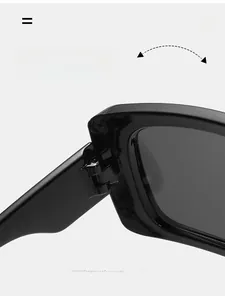 Macro shot of durable metal hinge on black oversized square hip-hop sunglasses
