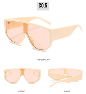 Three-way view of oversized shield sunglasses in beige with translucent orange lenses