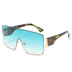 Oversized wrap-around sunglasses with blue-green gradient lenses and tortoiseshell temples
