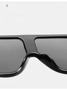 Detailed close-up of comfortable integrated nose pads on oversized black sunglasses