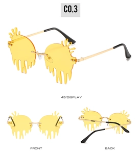 Three views of yellow drip shaped rimless sunglasses with gold metal temples and C0.3 mark