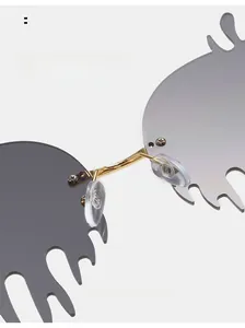 Close-up of comfortable nose pads and gold metal bridge on flame shape sunglasses