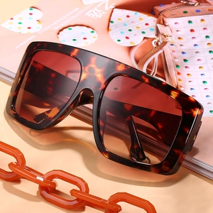 Oversized leopard print square sunglasses with dark brown lenses for a retro hip-hop style