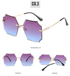 Detail of rimless gradient purple sunglasses with engraved gold metal temples