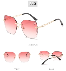 Three views of rimless butterfly sunglasses with pink gradient lenses and gold chain temples