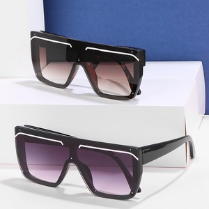 Flat top oversized square sunglasses with tortoiseshell and black frames and gradient lenses