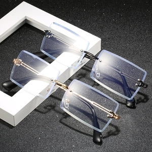 Three square rimless anti-blue light glasses with gold and black metal temples